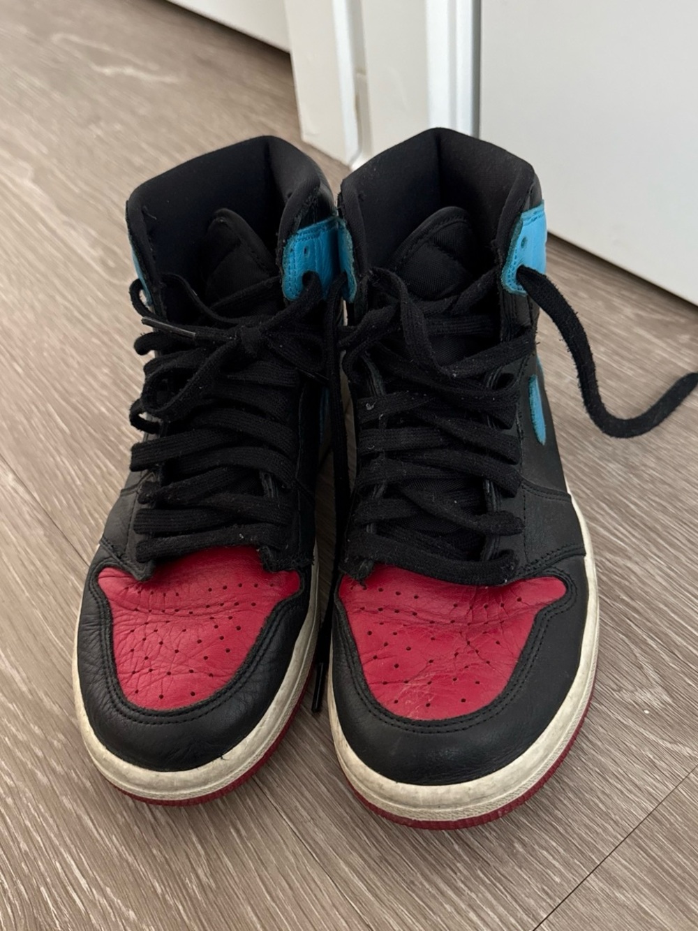 Jordan 1 Retro “Black Toe” High-Top Sneakers in Black, Red & Blue